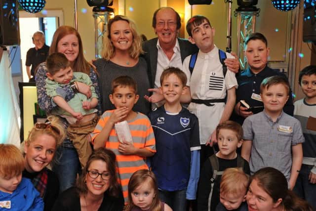 Children throughout the Portsmouth area who have long-term illness enjoy The Mad Hatters party which is held once a year at The Marriott Hotel in Portsmouth. Charlie Brooks and Fred Dinenage with the children.
Picture Ian Hargreaves (160353-9)