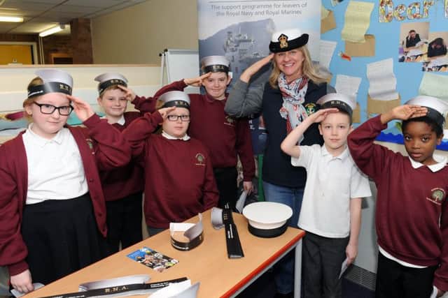 From left, Elouise Knight, Jacques Langan, Jamie Bryson, Coby Fleetwood, Chrissie Hughes from the Royal Naval Association, Finley Harris and Zantay Campbell
Picture: Sarah Standing (160512-7151)