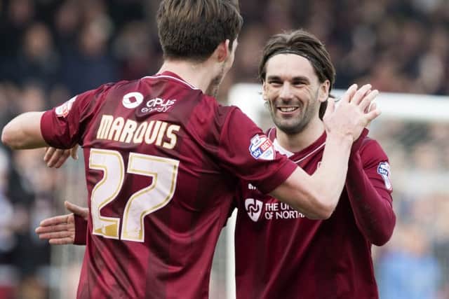 Alan Knight believes Ricky Holmes, right, & Co will have their minds on their summer holidays by the time champions-elect Northampton visit Fratton Park on the final game of the season Picture: Kirsty Edmonds