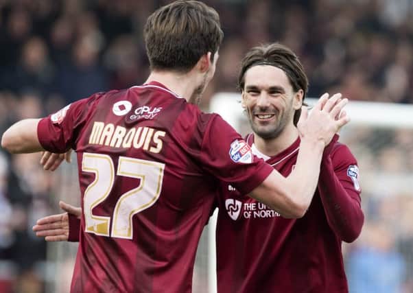 Alan Knight believes Ricky Holmes, right, & Co will have their minds on their summer holidays by the time champions-elect Northampton visit Fratton Park on the final game of the season Picture: Kirsty Edmonds