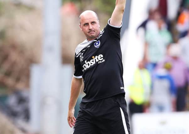 Pompey boss Paul Cook celebrates his sides victory over Plymouth at Home Park back in August but was unhappy with the Pilgrims late consolation goal Picture: Joe Pepler