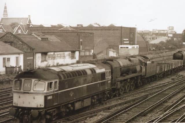 A sight to break any trainspotters heart. Three steam locomotives with coupling rods removed being towed to Salisbury for onward towing to a breakers yard.