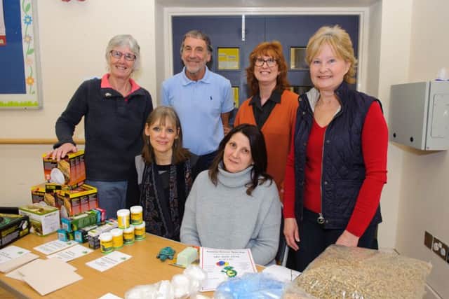 FOOD FOR THOUGHT The committee of the Hampshire Tortoise Society. From left: Pauline Bromly, Penny Daish, Doug Keen, Lorna Davis, Julie Hinks and Sue Tait Picture: Allan Hutchings (160425-023)