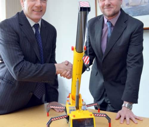 Grahame Pettit, left, welcomes Dave Gee