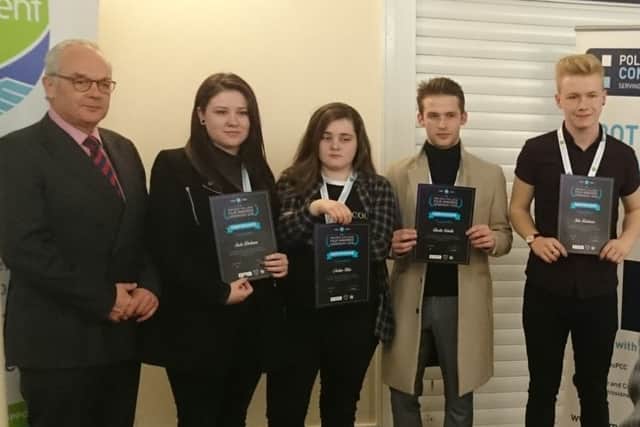 Students from Highbury College with their certificates alongside Simon Hayes, the police and crime commissioner for Hampshire