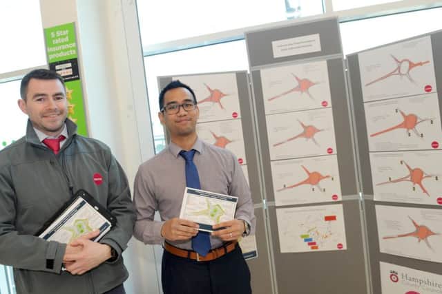 From left, Osborne site manager Matt Wilson and Chris Campos, engineer at Hampshire County Council, at the display of the Asda roundabout in Bedhampton plans
Picture: Sarah Standing (160523-8056)