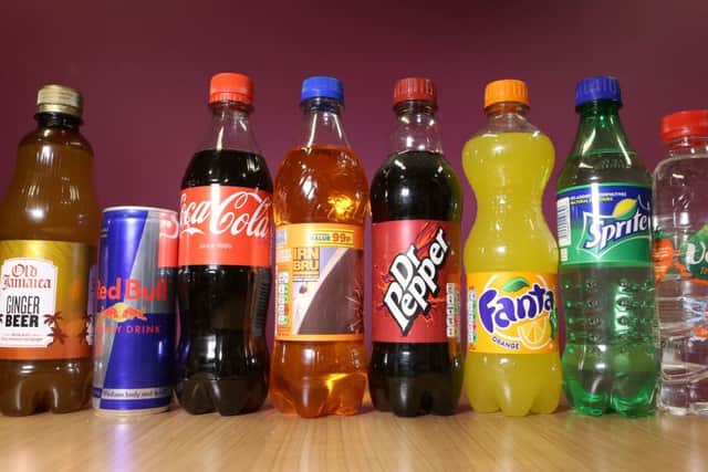 Bottles and cans of drinks which will be taxed on the amount of sugar they contain following the announcement of a tax on sugary drinks, unveiled by George Osborne as part of the Budget.
