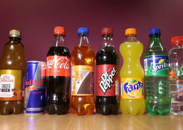 Bottles and cans of drinks which will be taxed on the amount of sugar they contain following the announcement of a tax on sugary drinks, unveiled by George Osborne as part of the Budget.