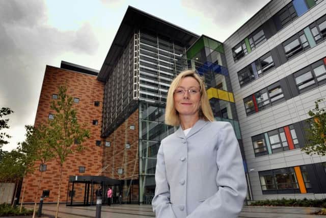 092316_35_HO_HOSPITAL_SR_26/6/09
Ursula Ward, chief executive of the Portsmouth Hospitals Trust, at the new entrance to Queen Alexandra Hospital.
PICTURE:STEVE REID(092316-35) ENGPPP00120120205110916