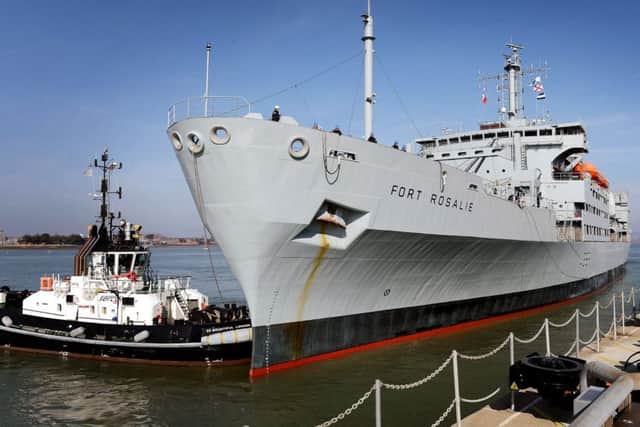 Fort Rosalie is towed by harbour tugs in Portsmouth Picture: L(Phot) IGGY Robert