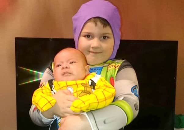 Thanks to Chipster Vinni-Jay for sending in this lovely picture of him as Buzz Lightyear and his brother Wesley-Jay as Woody. I love it.