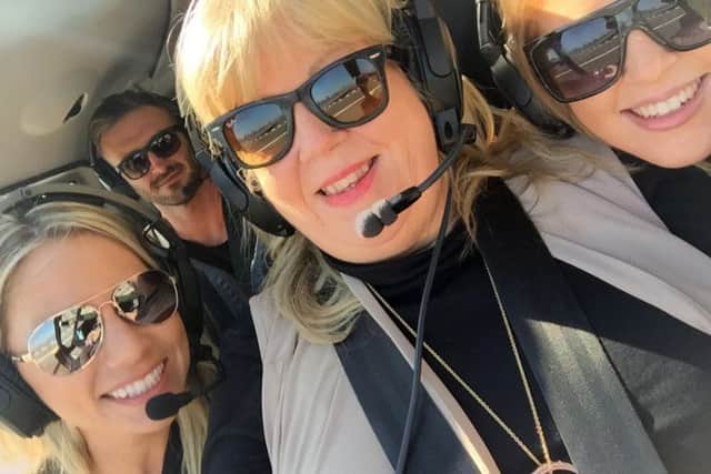 A group selfie from a helicopter ride over Manhattan