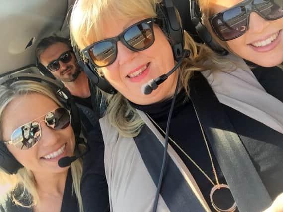 A group selfie from a helicopter ride over Manhattan