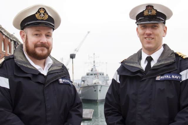 Warrant Officer 1 Alan Evans, left, with Lieutenant Commander Andy Brown