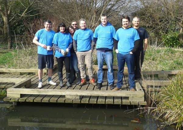 TEAM EFFORT Lockheed Martin staff helped out at Elson Junior School