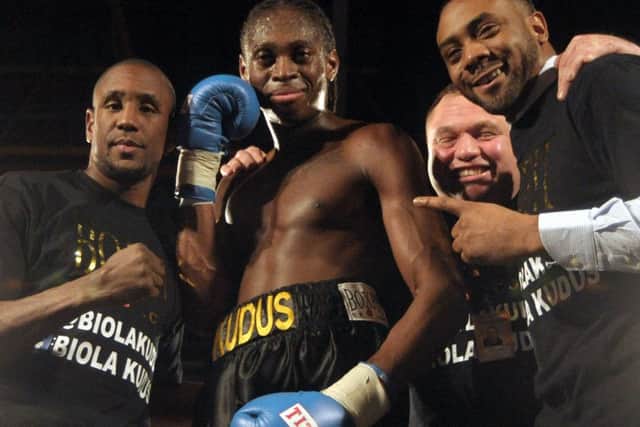 Biola Kudus, centre, with, from left, Darren Hamilton, trainer Barry Smith and manager Spencer Fearon Picture: Mick Young