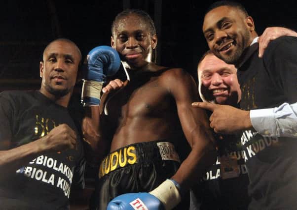 Biola Kudus, centre, with, from left, Darren Hamilton, trainer Barry Smith and manager Spencer Fearon Picture: Mick Young