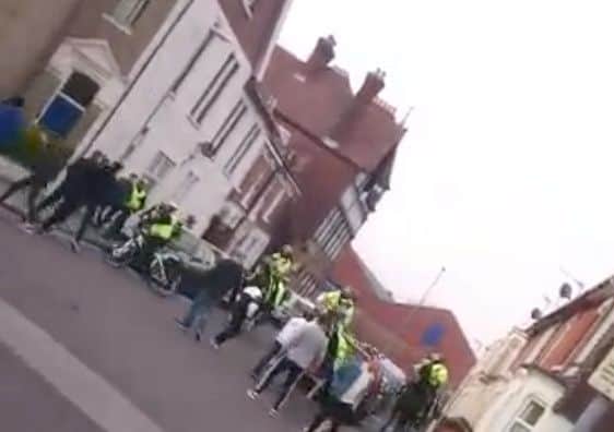 A mobile phone image of clashes between Pompey and Newport county fans