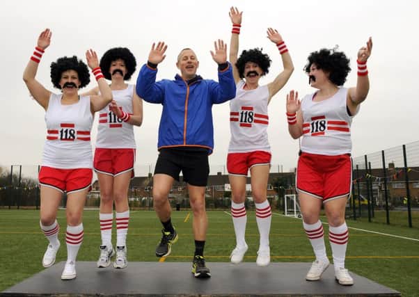 Staff at Park Community School, Leigh Park, including headteacher Chris Anders (centre)  joined in the Sport Relief fun