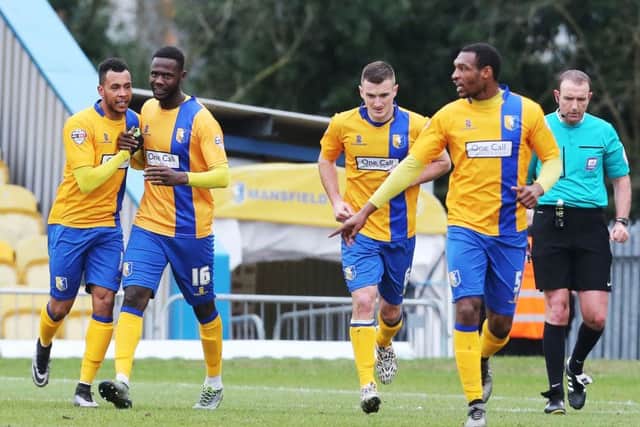 Mansfield celebrate Matt Green's goal against Pompey. Picture: Joe Pepler