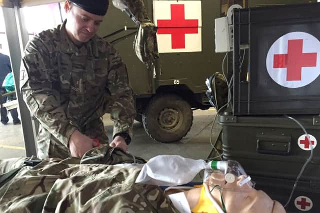 Andrew Thomas, a reservist who is an A&E nurse at QA Hospital