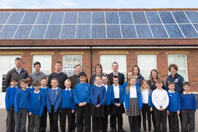Pupils at the Northern Parade schools in front of the new solar panels
Picture: Land Rover BAR