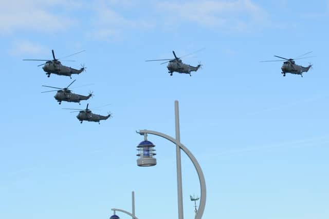 21/3/2016 (TC)The last batch of the Royal Navy's iconic search and rescue helicopters flew across Portsmouth City on Monday morning.Picture: Sarah Standing (160529-8449) PPP-160321-112718001