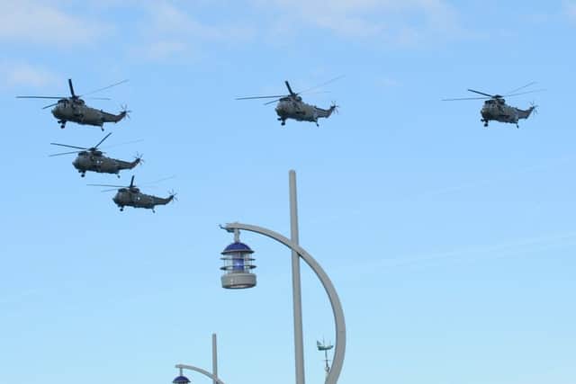 Sea Kings fly over Portsmouth Picture: Sarah Standing (160529-8449)