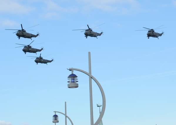 Sea Kings fly over Portsmouth Picture: Sarah Standing (160529-8449)