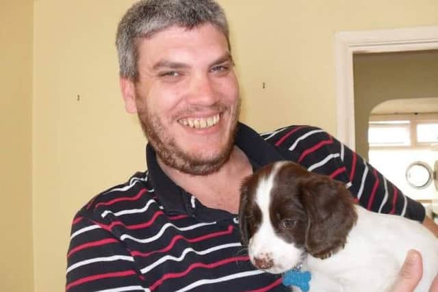 Missing man Jason Gates with his spaniel Max