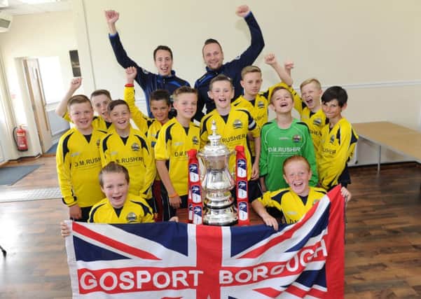 The FA Cup at Gosport Borough Football Club last year - now the team have got their hands on their own piece of silverware