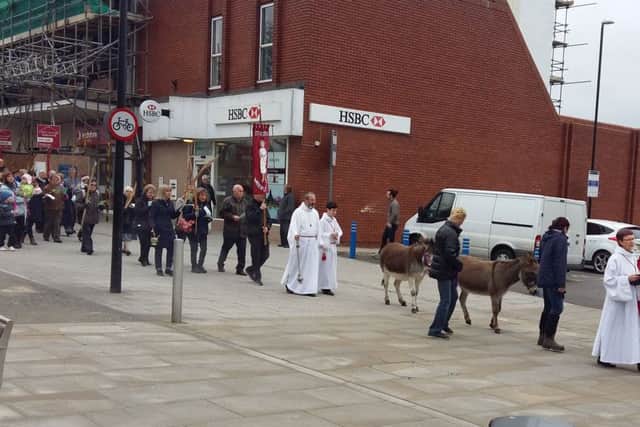 St Georges Church took part in a Palm Sunday procession through the centre of Waterlooville