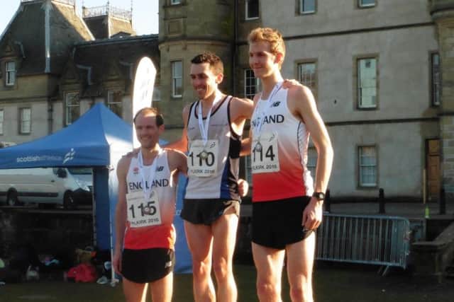 Alex Teuten, right, on the podium in Falkirk