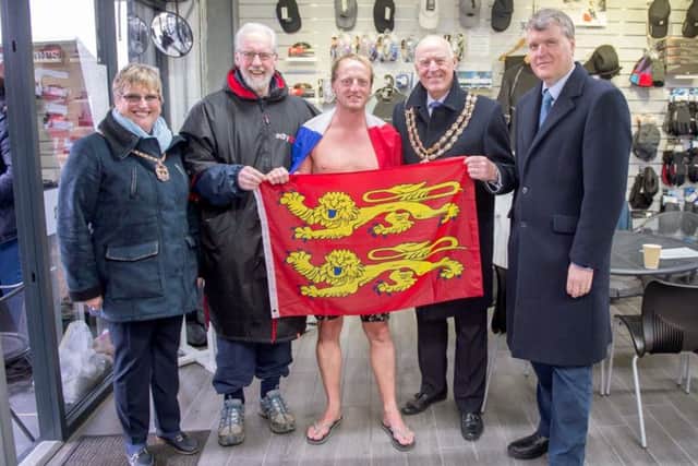 Mike and Anne pictured with a French competitor at the Ice Swimming Championship