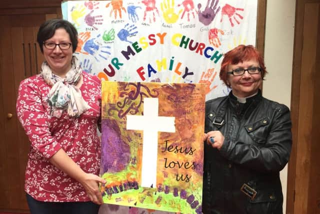 EXPLORING EASTER Gail Norris, one of the Messy Church leaders, and Claire Towns, the vicar of St Barnabas Church