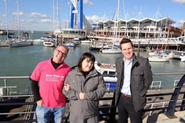From left, Con Attridge, a trustee of Rose Road Association with his daughter Katie, who has autism and uses the service and Neil Wilson, director at Rose Road  Picture: Sarah Standing (160504-6269)