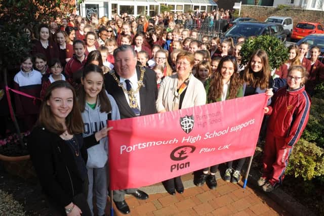 Front from left, deputy head girl Daisy Turnbull, Eliot House captain Ellie Higgins, The Lord Mayor of Portsmouth Frank Jonas, headteacher Jane Prescott, head girl Anna Mackay, deputy head girl Lara Bird and Nell Newport Spiers before they set off on the walk. Picture: Sarah Standing (160531-8536)