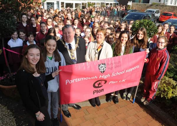 Front from left, deputy head girl Daisy Turnbull, Eliot House captain Ellie Higgins, The Lord Mayor of Portsmouth Frank Jonas, headteacher Jane Prescott, head girl Anna Mackay, deputy head girl Lara Bird and Nell Newport Spiers before they set off on the walk. 

Picture: Sarah Standing (160531-8536)