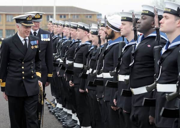 GUEST OF HONOUR Cdre David Elford, left, took the salute at HMS Sultan 	             Picture: la(phot) Dave Jenkins