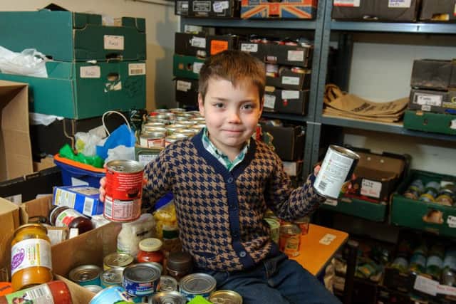 Ronnie Hazlie, eight, has collected more than a 1,000 and tins of food and donated them to Gosport Basics Bank.
Picture: Allan Hutchings (160144-275)