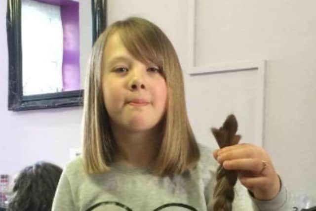 Daisy Smith, nine, had her hair cut off for The Little Princess Trust