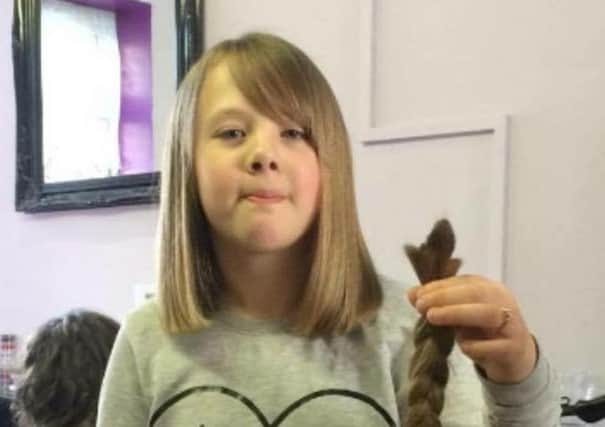 Daisy Smith, nine, had her hair cut off for The Little Princess Trust