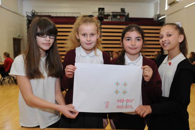 From left, Izzy Doyle, Grace Dixon, Caitlin Bitri and Hatty Robbins from Meon Junior School at the Maths Challenge. Picture: Sarah Standing (160517-7487)