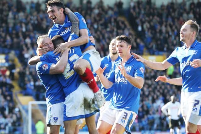Pompey celebrate Kyle Bennett's opening goal. Picture: Joe Pepler