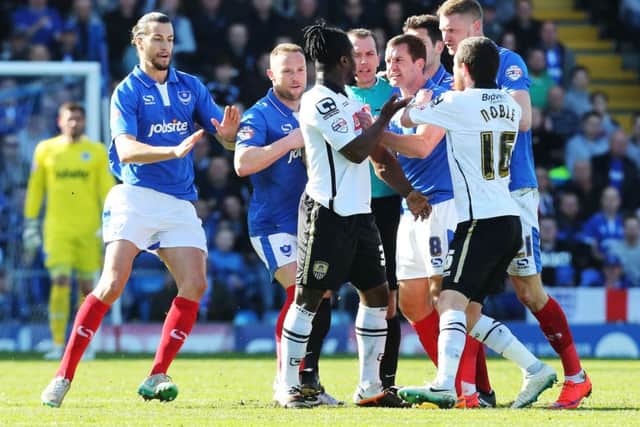 Michael Doyle and Stanley Aborah have words. Picture: Joe Pepler