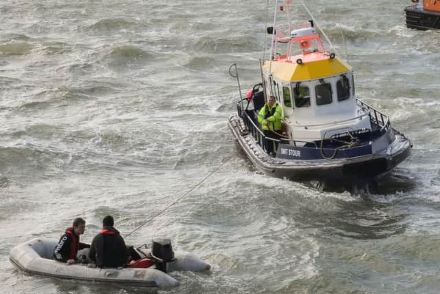 A crew working for Boskalis in the Solent rescued two men who were in difficulty in their dinghy at 1.50pm just off Old Portsmouth 
Picture: Keith Woodland Photography / www.kwoodlandphotography.co.uk
