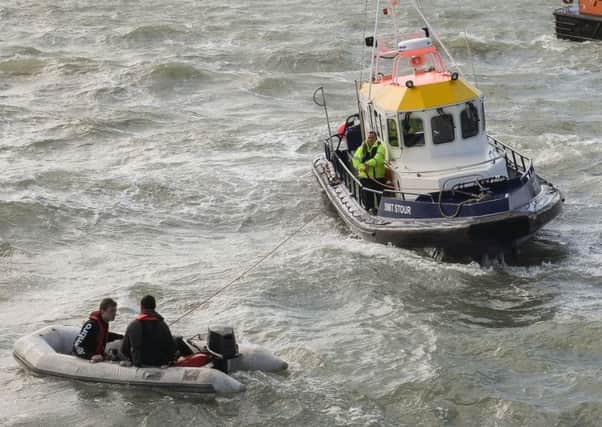 A crew working for Boskalis in the Solent rescued two men who were in difficulty in their dinghy at 1.50pm just off Old Portsmouth 
Picture: Keith Woodland Photography / 
www.kwoodlandphotography.co.uk