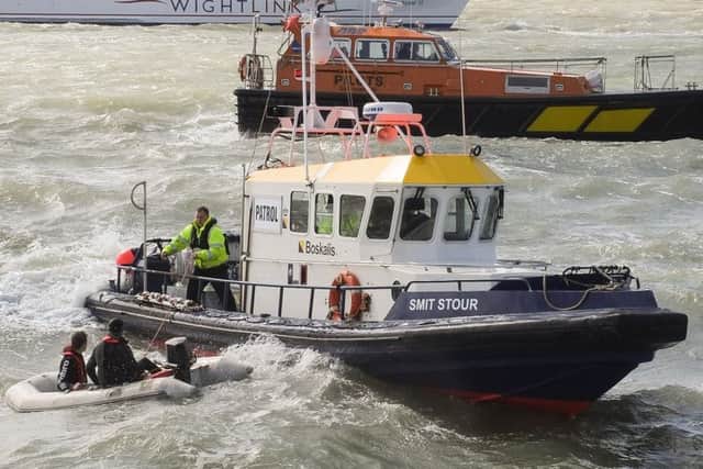 A crew working for Boskalis in the Solent rescued two men who were in difficulty in their dinghy at 1.50pm just off Old Portsmouth 
Picture: Keith Woodland Photography / www.kwoodlandphotography.co.uk