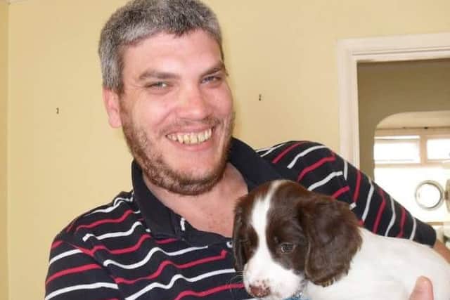 Missing man Jason Gates with his spaniel Max
