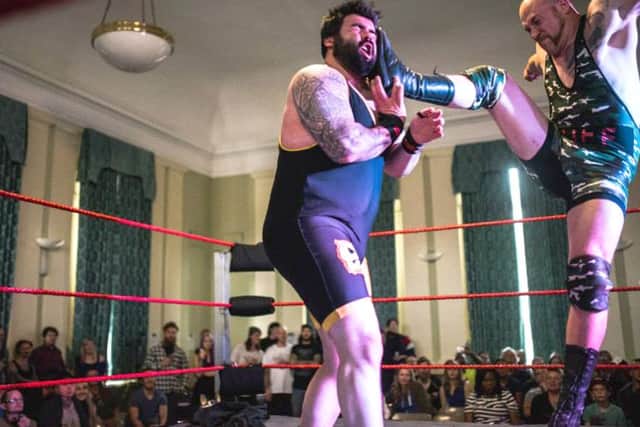 Mad Dog Brian Quinn on the receiving end of Major Lee Buff's boot
